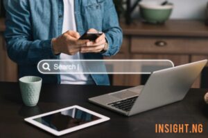 man typing into phone